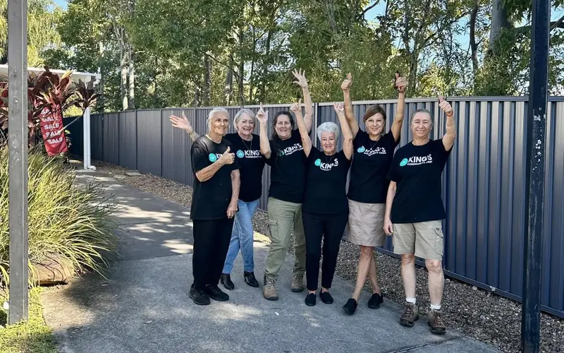 Volunteers celebrating outside the King's Community Care op shop