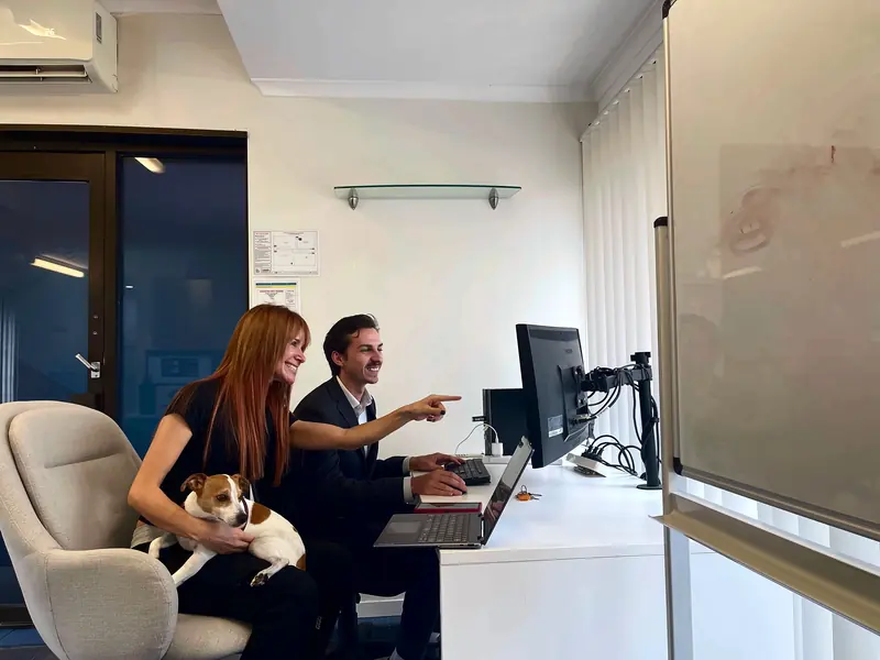 SEO Expert Gold Coast team working on a client website at a desk in the Mudgeeraba office